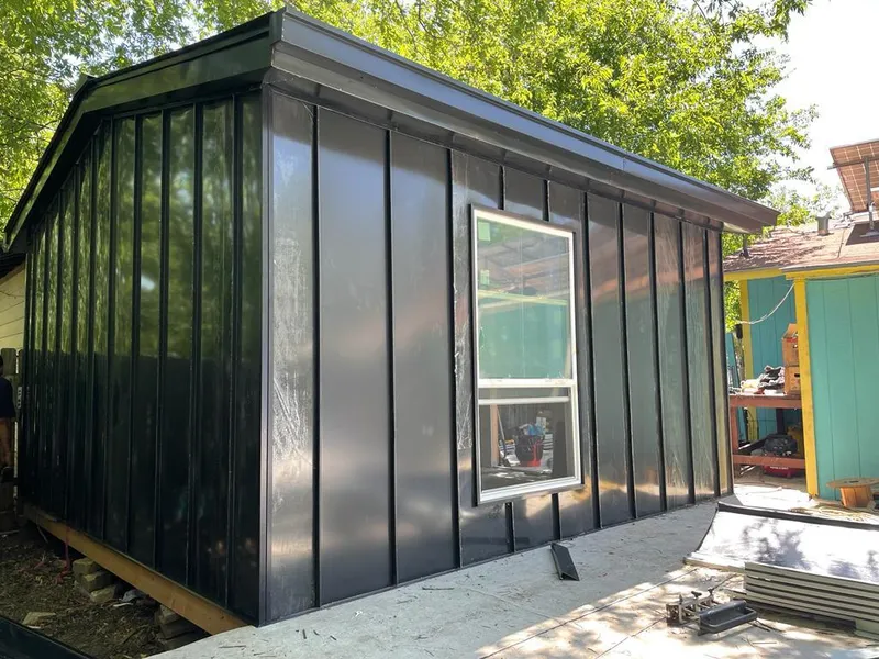 Black standing seam metal wall panels for Metal Roof Installation in Strasburg