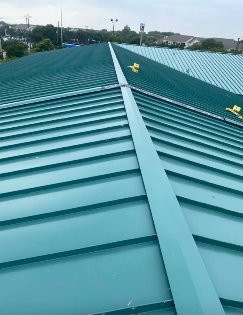 Green commercial metal roof ridge and valley for Metal Roof Repair in Strasburg